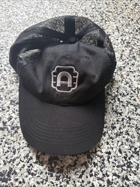 Black Mesh Trucker Hat with White Embroidered Logo